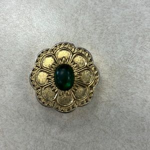 Jeweled compact gold green gemstone!